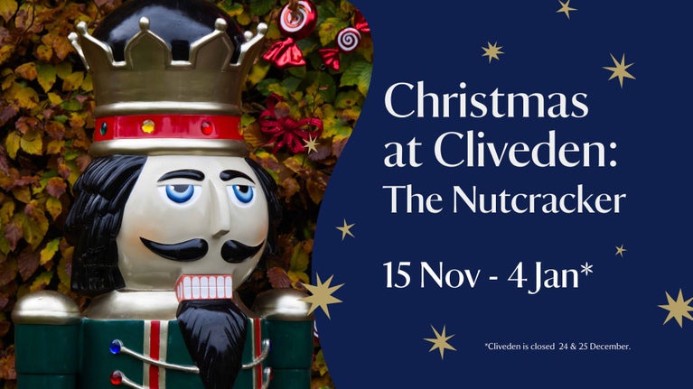 A graphic of a blue and red Christmas nutcracker.